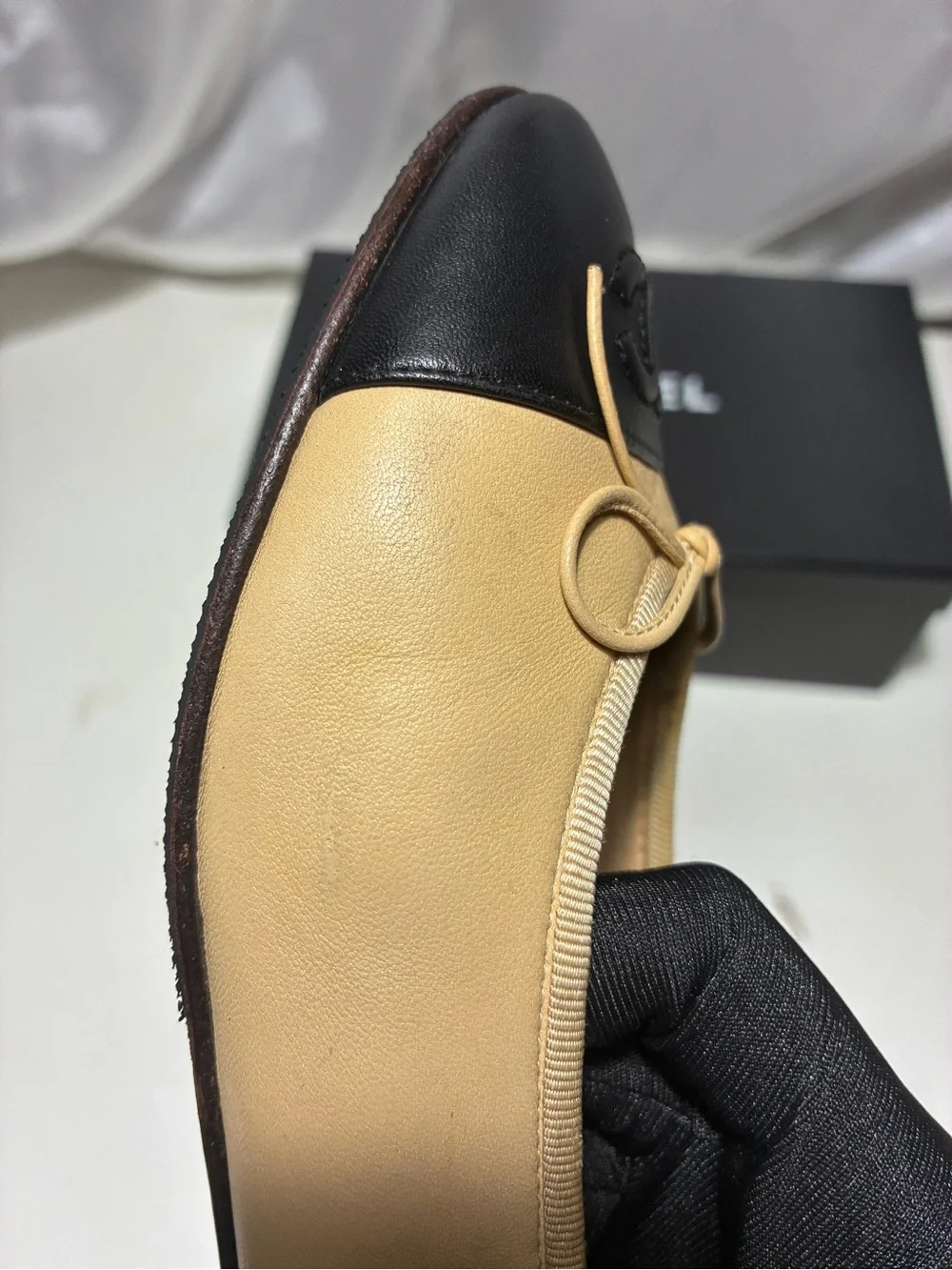 CHANEL Beige Leather Ballet Flats with Black Cap Toe